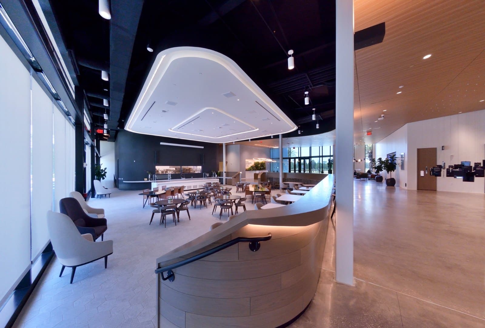 Johnson & Johnson HPI — cafe with sculptural ceiling and floor-to-ceiling glazing