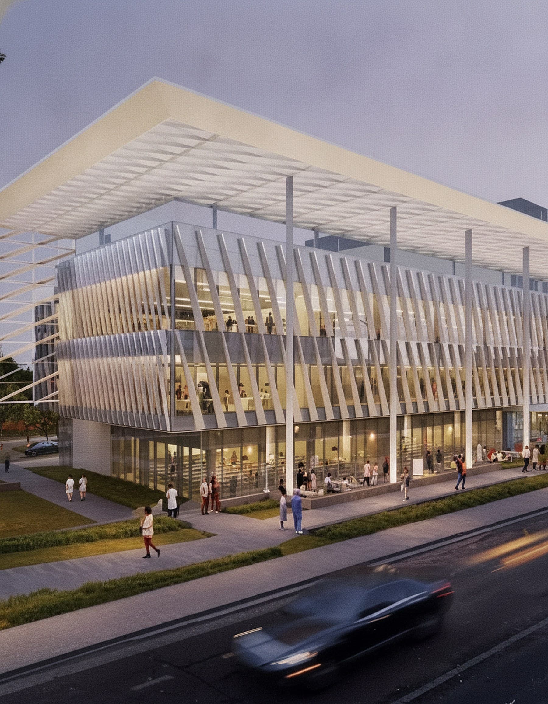 Tower Hill Insurance Headquarters — dusk exterior with vertical sunshade fins over full-height glazing, Alachua, FL